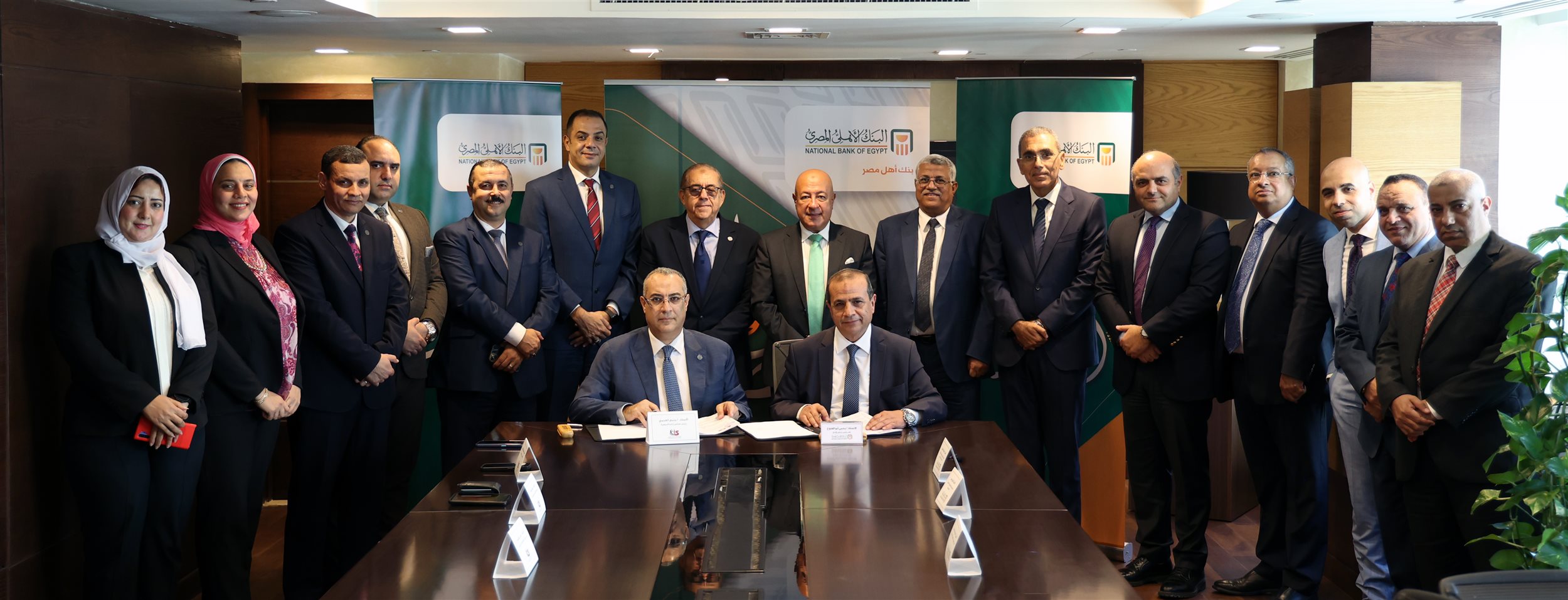 توقيع اتفاقية بين البنك الأهلي المصري والجمعية المصرية للتأمين التعاوني
