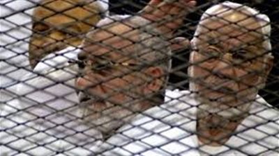 وصول قيادات الإخوان لأكاديمية الشرطة لبدء محاكمتهم في قضية «التخابر»