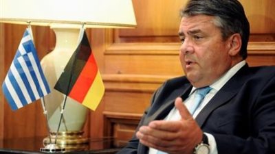 وزير الاقتصاد الألماني يحث الشركات الكبيرة على توظيف اللاجئين