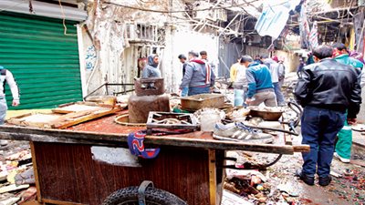 مقتل 14 شخصا وإصابة 50 آخرين في انفجارين بالعراق