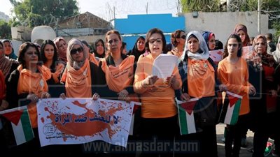 سلسلة بشرية في غزة لمناهضة العنف ضد المرأة