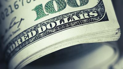 الدولار يعزز مكاسبه مع انحسار تقلبات المستثمرين