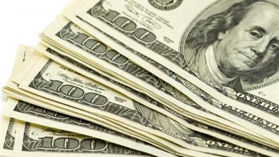 إرتفاع الدولار مع إنحسار المخاوف في الأسواق بشأن اليوان