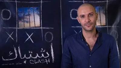 الممثلان العالميان هانكس وكريج يشيدان بمخرج فيلم 