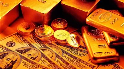 الذهب يصعد مع ضعف الدولار إلى أدنى مستوى في أسبوعين