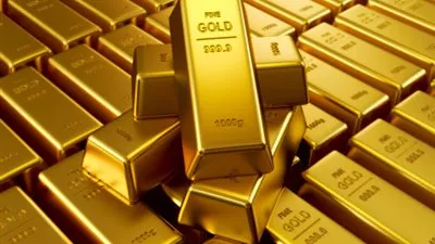 الذهب يهبط مع إرتفاع الدولار وتباطؤ النمو الاقتصادي يضغط على الأسعار