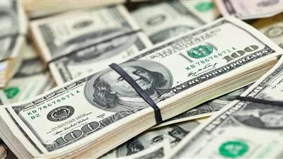استقرار الدولار قرب أقل مستوى في أسبوع 
