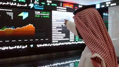 البورصة السعودية تغلق منخفضة وقطاع العقارات يهبط بسوق دبي