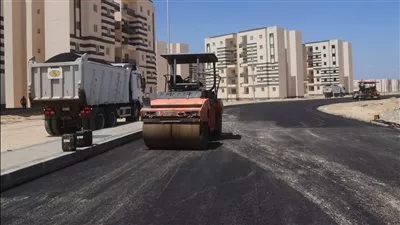 أجهزة المدن الجديدة تواصل تنفيذ أعمال رفع كفاءة وتطوير الطرق 