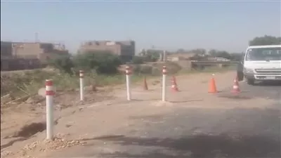 هيئة الطرق تجري صيانة عاجلة لتأمين سلامة المرور بمدخل طريق أرمنت الواحات