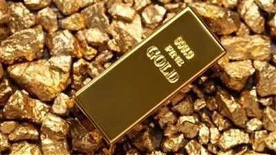 الذهب يتراجع مع ارتفاع الدولار بعد خفض الفائدة الأمريكية