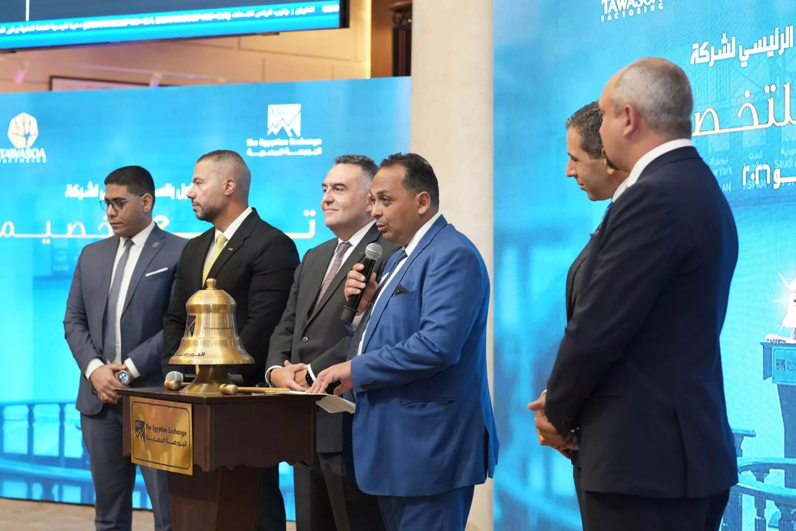 رئيس البورصة يشارك قيادات شركة توسع للتخصيم بقرع الجرس