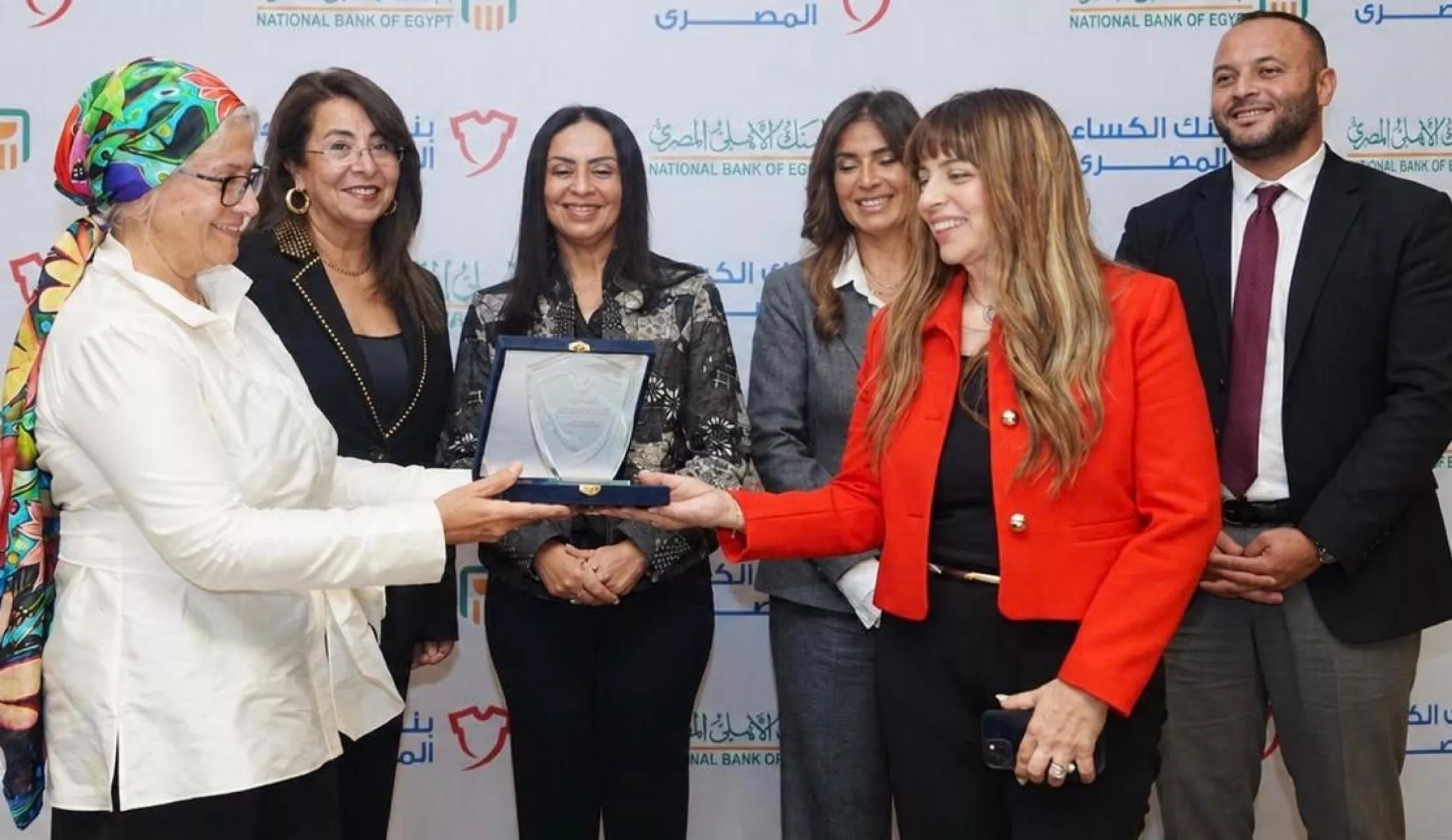 البنك الأهلي يوقع بروتوكول تعاون لتنفيذ مشروع ملابس الكرامة