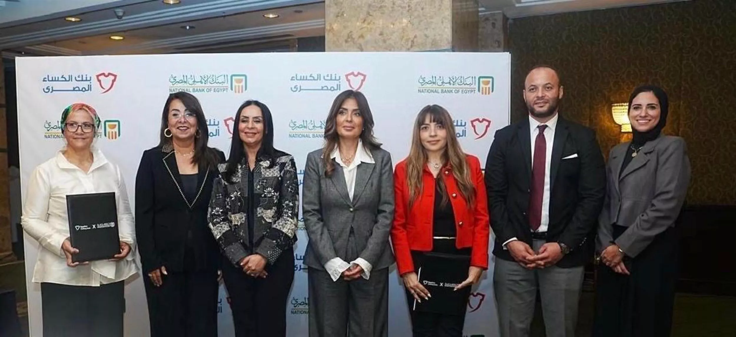 البنك الأهلي يوقع بروتوكول تعاون لتنفيذ مشروع ملابس الكرامة