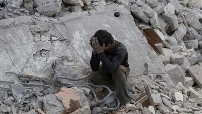 مقتل 12 شخصا معظمهم طلاب في قصف للنظام السوري على مدرسة بحلب