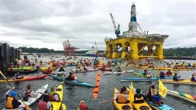 بالفيديو.. نشطاء البيئة يتظاهرون ضد شركة 