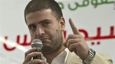 بلاغ ضد نجلي مرسي بالتحريض ضد مؤسسات الدولة